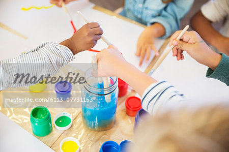 Students painting in class