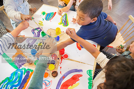Children painting in class