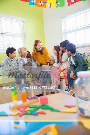Teacher and students reading in classroom Teacher and students reading in classroom