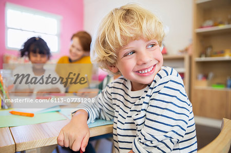 Student smiling in classroom