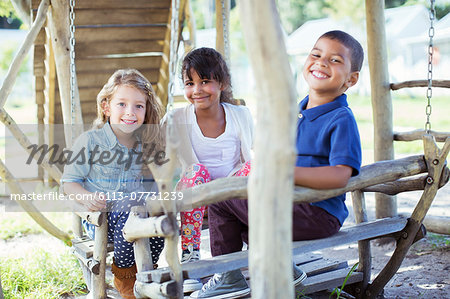 Children playing on play structure