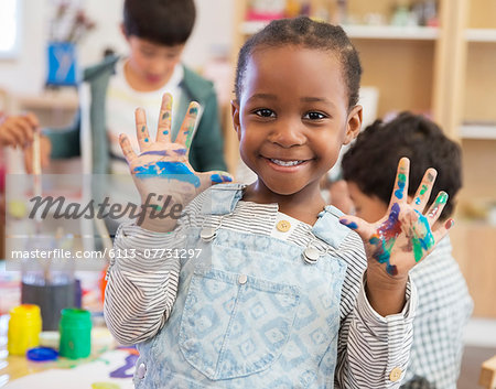 Student with messy hands in classroom