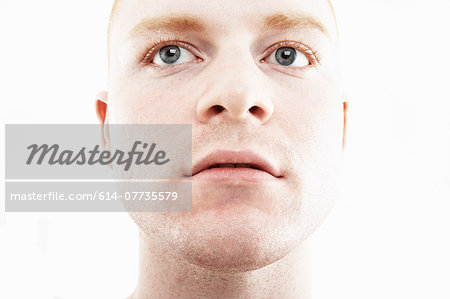 Close up studio portrait of young man