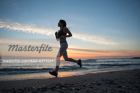 Young Girl Running On The Beach Young Girl Running On The Beach