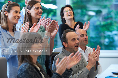 Businesspeople applauding Businesspeople applauding