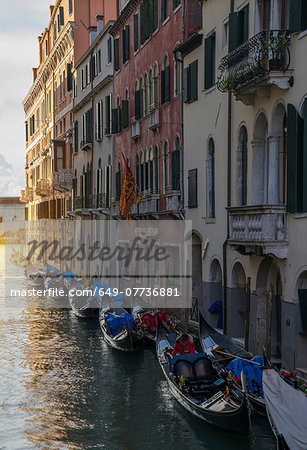 A row of gondolas and the Island of San Giorgio, Venice, Veneto, Italy