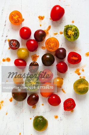 Various tomatoes on wooden board