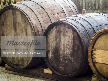 Old wine barrels in a cellar in the Kakheti wine region, Georgia, Caucasus