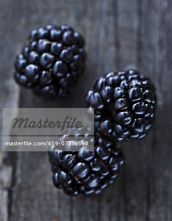Blackberries on a wooden surface