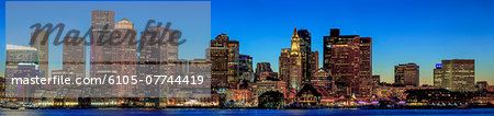 Boston skyline with the Seaport District and Moakley Courthouse at dusk viewed from East Boston, Massachusetts, USA Boston skyline with the Seaport District and Moakley Courthouse at dusk viewed from East Boston, Massachusetts, USA