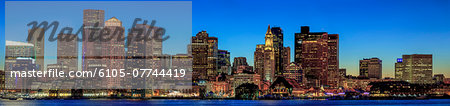 Boston skyline with the Seaport District and Moakley Courthouse at dusk viewed from East Boston, Massachusetts, USA