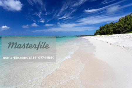 Idyllic beach scene with blue sky, aquamarine sea and soft sand, Ile Aux Cerfs, Mauritius, Indian Ocean, Africa