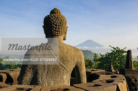 Sitting Buddha in the temple complex of Borobodur, UNESCO World Heritage Site, Java, Indonesia, Southeast Asia, Asia