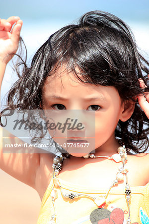 Portrait of the beautiful small Asian girl. Indonesia