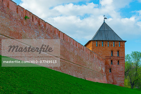 red brick wall of the Kremlin and the tower. Veliky Novgorod, Russia