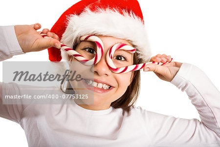 Festive little girl smiling at camera on white background