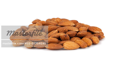 Heap of almond nuts isolated on white background