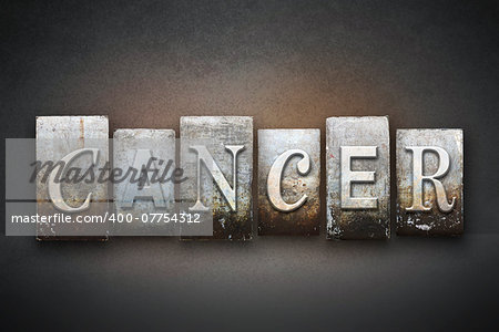 The word CANCER written in vintage letterpress type