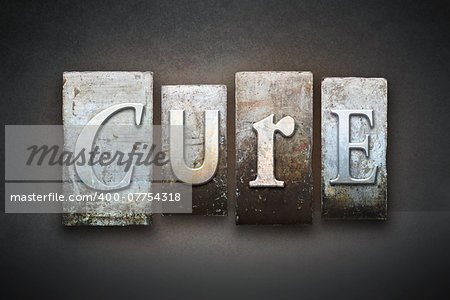 The word CURE written in vintage letterpress type