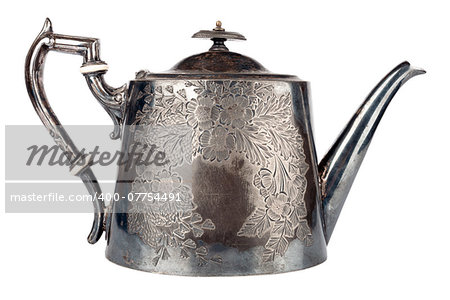 Antique teapot decorated with flowers on white background