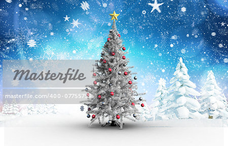 Christmas tree with baubles and star against snowy landscape with fir trees