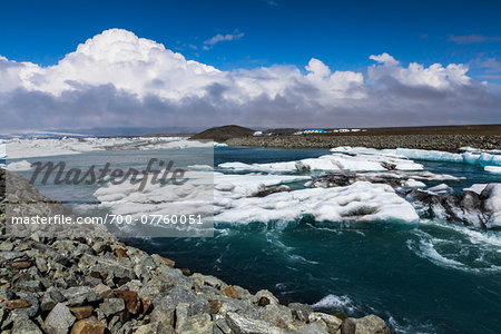 Scenic view of shoreline with ice and glacial lake water, Jokulsarlon, Iceland