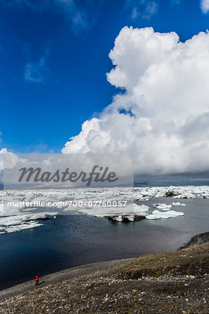 High angle view of shoreline with ice and glacial lake water, Jokulsarlon, Iceland