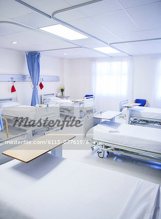 Empty beds in hospital room Empty beds in hospital room