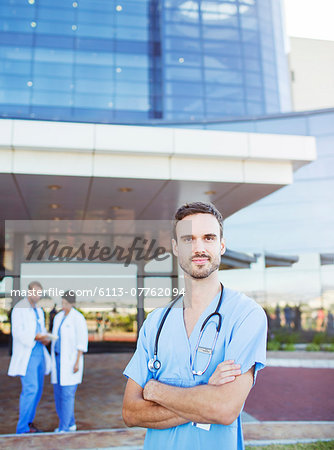 Nurse standing outside hospital