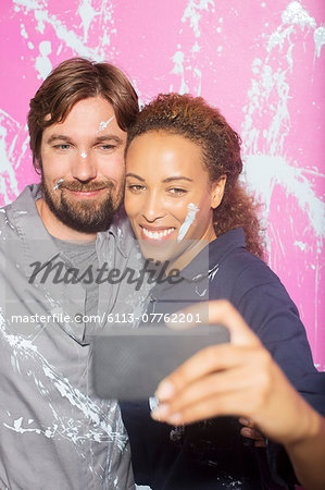 Couple taking picture together on cell phone