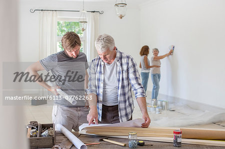 Family working in living space together