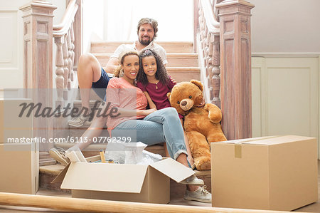 Family sitting on stairs together