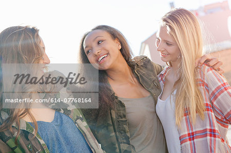 Teenage girls laughing