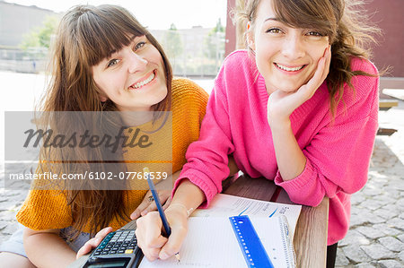 Teenage girls studying, Sweden