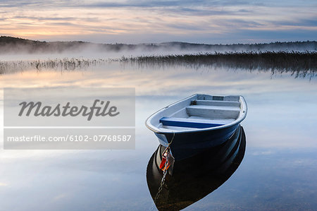 Rowing boat on lake, Molnlycke, Vastergotland, Sweden