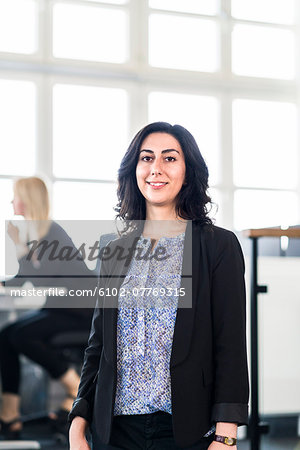 Young businesswoman in office