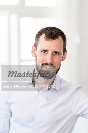 Portrait of mid adult businessman
