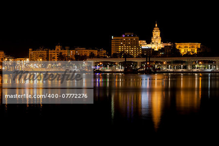 Malaga Harbour city reflection on the water