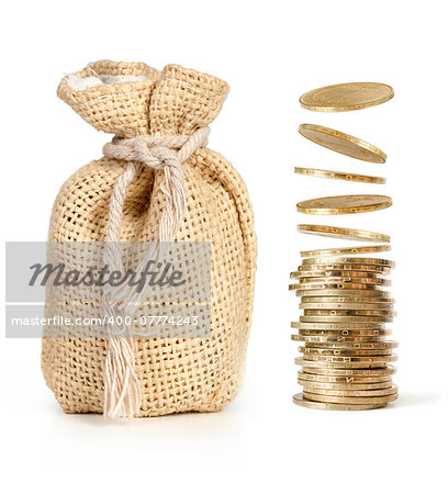 Stack of coins and money bag