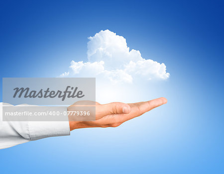 Cloud computing, close up of male hand holding cloud with copy space