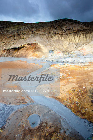 Boiling mud pools and stream at Seltun, part of the Krysuvik goethermal area on the Reykjanes Peninsula, Iceland, Polar Regions