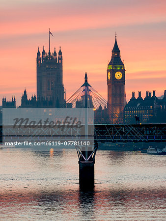 Big Ben with Hungerford Bridge at sunset, London, England, United Kingdom, Europe