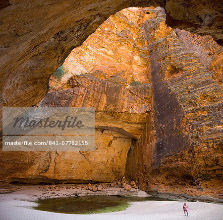 Cave in waterfall undercut, Cathedral Gorge in Purnululu National Park (Bungle Bungle), UNESCO World Heritage Site, Western Australia, Australia, Pacific Cave in waterfall undercut, Cathedral Gorge in Purnululu National Park (Bungle Bungle), UNESCO World Heritage Site, Western Australia, Australia, Pacific