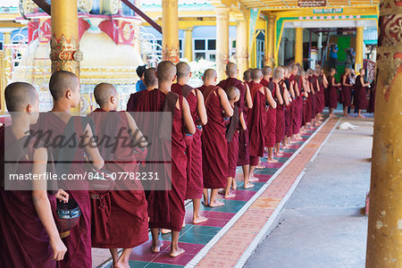 Meal time at the Kha Khat Wain Kyaung monastery, Bago, Myanmar (Burma), Asia