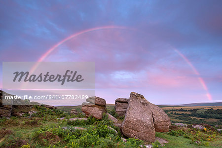 Rainbow over Holwell Tor at sunrise, Dartmoor, Devon, England, United Kingdom, Europe