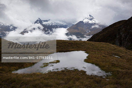 Darran Mountains and tarn from Harris Saddle, Routeburn Track, Fiordland National Park, UNESCO World Heritage Site, South Island, New Zealand, Pacific