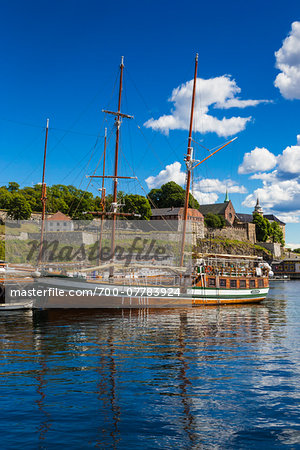 Ships in Oslo Harbour with Akershus Fortress, Oslo, Norway
