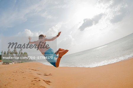 Boy Jumping in Air, Negombo Beach, Negombo, Western Province, Sri Lanka