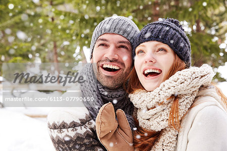 Couple admiring the snow together