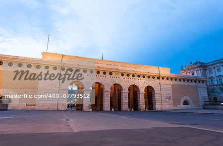 VIENNA, AUSTRIA - AUGUST 4, 2013: Auseres Burgtor Gate monument at night in Vienna, Austria